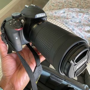 Nikon D3400 DSLR. Comes with 3 lenses and a camera bag!